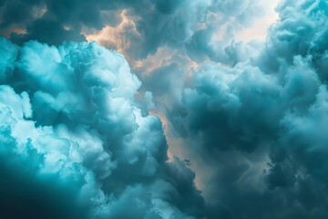 Abstract blue and white clouds with light shining through, creating a dramatic and ethereal sky.