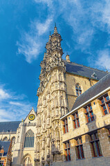 Fototapeta premium Saint Peter's Roman Catholic Church Sint-Pieterskerk and Town Hall Brabantine Gothic style building on Grote Markt Big Market square in Leuven city historical center, Flemish Region, Belgium
