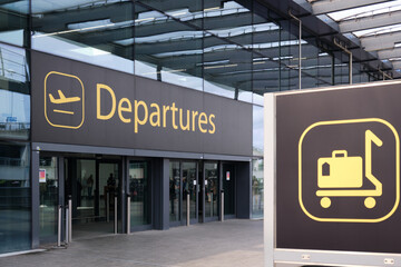 Gatwick Airport, London, United Kingdom:  April 22 2024. Entrance to departures. Signage in...