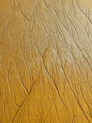 Texture of water flowing on sand