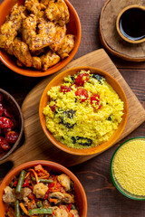 Traditional Israeli lunch couscous vegetables, chicken and dried fruits