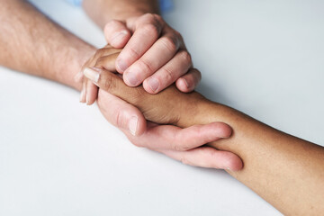 Hands, support and couple in collaboration for help, empathy and respect in studio. People, love...