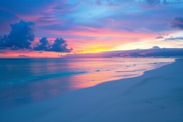 Fototapeta premium A vibrant sunrise over a pristine tropical beach, with the sky and water illuminated in soft colors, highlighting a new day