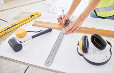 Architecture, hands and ruler on table for measurement, construction planning or sketch of...