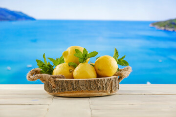 Lemon fruit and mint leaves, cold fresh drinks in summer season time.