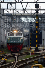 View of a passenger train traveling in a rural area