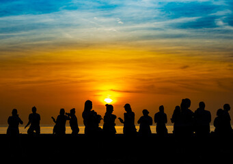 silhouette of people on sunrise at while waiting to star a small run