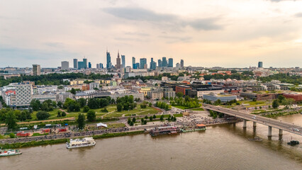Fototapeta premium panoramic aerial view of Warsaw city at sunset in summer over the river