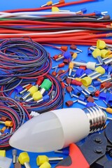 Materials for electrical installation work during the assembly of electrical equipment. Close-up. Soft focus.