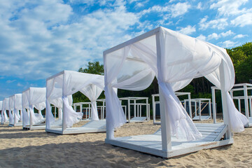 beach canopies with white curtains
