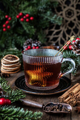 Christmas composition with    hot  tea drink, selective focus