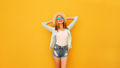 Summer vacation, happy joyful relaxed young woman enjoys sunny warm day on bright yellow background