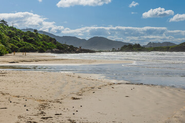 Coastline with beach and ocean with waves in Florianopolis