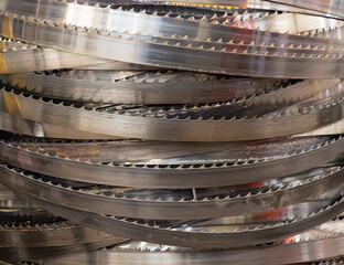 Stack of used stainless steel band saw blades