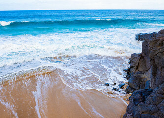 Waves and Lava Sea Cliffs at Kahalahala Beach, Kauai, Hawaii, USA