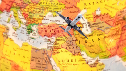 Passenger plane taking off against the background of part of the world map.
