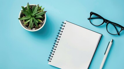 School supplies on pink background with copy space