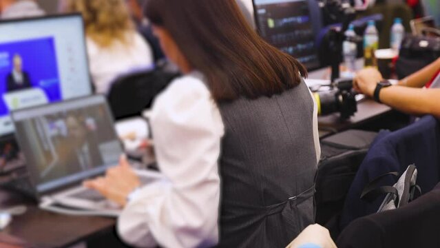 Journalists and correspondents working in media press center, live broadcasting, tv studio channel office, news report coverage of the political forum event, cameraman and editor, creating the news