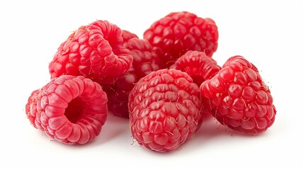 Close-up of several ripe raspberries on a white background.