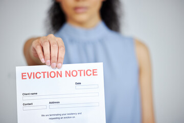 Woman, eviction and notice paperwork in home, homeowner crisis and tenant with legal vacate document. Apartment, finance bankruptcy and failed investment, overdue payment and rent or tenancy problem