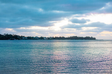 A stunningly picturesque beach on a cloudy day in Mauritius