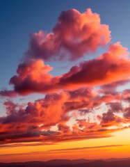 Beautiful cloudscape at sunset. Aerial view of the clouds.