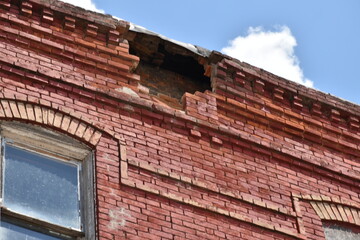 Fototapeta premium Damaged Brick Building