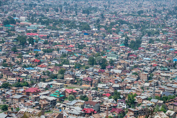 An aerial view of a city with numerous buildings and trees, Srinagar, Kashmir, India