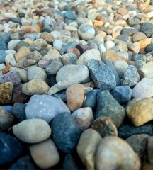 Small smooth pebbles at the beach