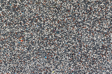 Fototapeta premium Colored Dark Stone Plaster Background with multicolored Stones - Mineral Texture