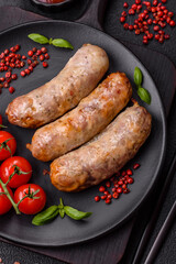 Baked chicken or pork sausages, salt, spices and herbs