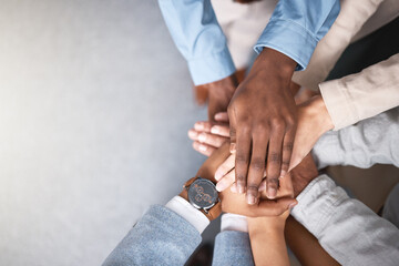 Business people, hands stack and support above for collaboration and inclusion in office for equality. Workplace community, staff and huddle together for solidarity and cooperation with team building