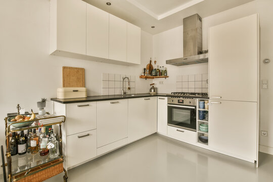 Modern kitchen interior with clean white cabinetry