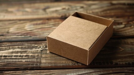 Box made of paper on a wooden surface