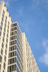 Obraz premium amazing capture of building with many edges lines architecture and windows in a downtown city scape area during the day