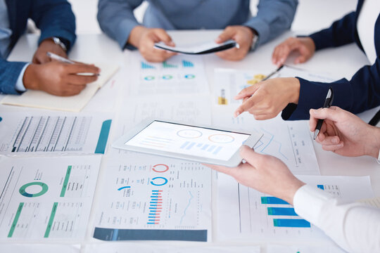 Meeting, paperwork and business people hands with tablet for teamwork and infographic with sales feedback. Documents, staff and tech screen with data analytics for global income statistics in office