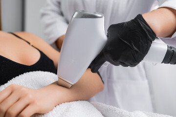 Lady achieves hair-free arms through laser hair removal technology. Procedure results in...