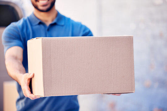 Hands, package and delivery man with box in outdoor for distribution, courier service or stock. Cargo, logistics and employee with cardboard parcel for export, shipping or commercial supplier