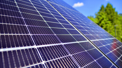 Group of solar panels on a blue sky. Concept of solar energy.