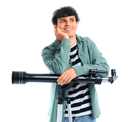 Young man with telescope isolated on white