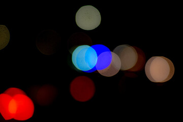 abstract image of lights of different colors with blur to create circular geometric shapes