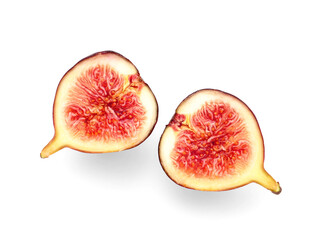 Halves of fresh ripe fig on white background