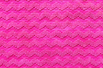 Closeup view of pink fabric texture as background