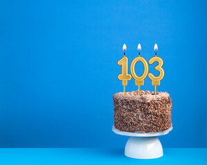 Birthday cake with candle 103 - Invitation card on blue background