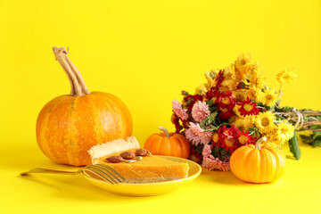 Plate with piece of delicious pumpkin tart and beautiful flowers on yellow background
