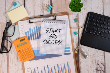 Wooden blocks with words 'Start Seo Success'.