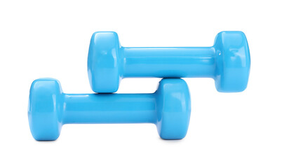 Light blue dumbbells isolated on white. Sports equipment