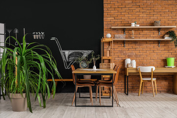 Dining table with chairs in room