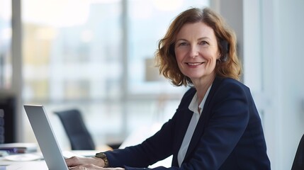 Happy smiling mature middle aged professional business woman investor manager executive or attorney adviser looking at camera at workplace working on laptop computer in office vertical : Generative AI