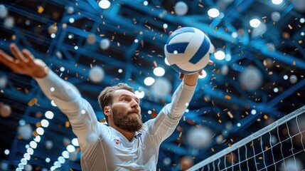 A man in a white shirt is playing volleyball and is about to hit the ball. The scene is set in a gym with a net and a crowd watching